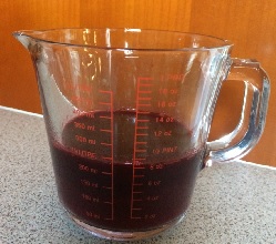 Blackberry juice in a glas jug