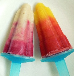Two gentle shade ice lollies one made with banana and the other with mango
